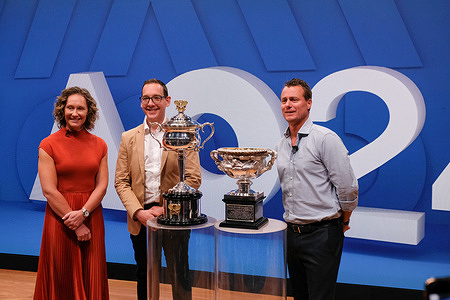 (L-R) Former Australian tennis player Samantha Stosur, Victorian Minister for Sport, Steve Dimopoulos, and Former Australian tennis players Lleyton Hewitt pose with AO Trophies at the Australian Open 2024 Media Launch.