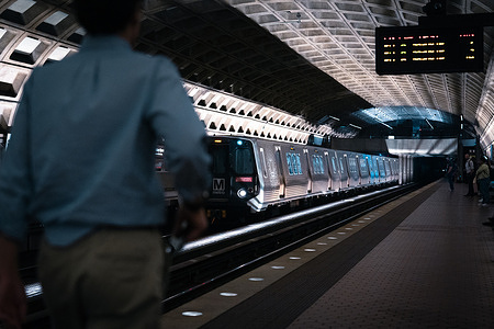 A man walks along the platform at a metro station in Washington.