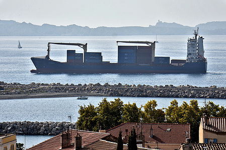 The container ship OPS Hamburg arrives at the French Mediterranean port of Marseille.