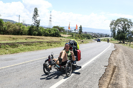 Yves Kino, A French adventurer and Youtuber cycles through Nakuru Town on his recumbent bike (e-trike) as he makes his way to Uganda. Yves travels around the world documenting his journey on Youtube.