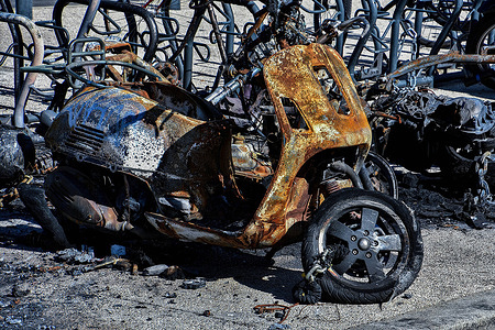 A burnt scooter is seen at a parking lot at Saint-Charles station in Marseille. An unidentified person with an unclear motive vandalized some scooters by setting them on fire.