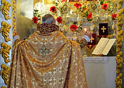 A cleric is seen praying during the mass in Diyarbakir. A small group of Armenians in Diyarbakir, Turkey, celebrated the name day of the Surp Giragos Armenian Church with a religious service. The Surp Giragos Church is the largest Armenian church in the Middle East, and its building dates back to 1518 BC.