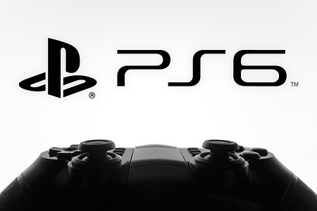 In this photo illustration, the PlayStation 6 (PS 6) logo is displayed on a computer screen, next to a gamepad.