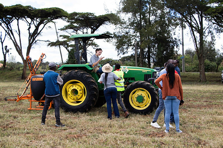 Participants examine a tractor during the Mechanization and Conservation Agriculture Exhibition organized by the Kenya Agricultural Livestock and Research Organization (KALRO) and partner organizations in Nakuru. The event aimed to promote crop diversification for resilient agricultural food systems to help mitigate impacts of climate change by de-risking through diversification.