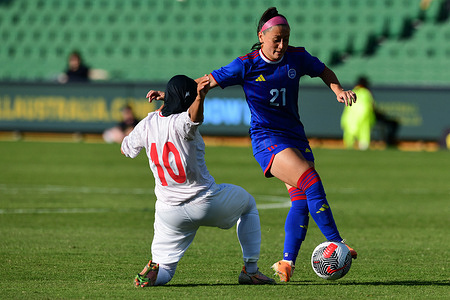 Behnaz Taherkhani (L) of the Islamic Republic of Iran women's football team and Katrina Jacqueline Guillou (R) of the Philippines women's football team seen in action during the 2024 AFC Women's Olympic Qualifying Tournament Round 2 Group A match between Philippines and Islamic republic of Iran at Perth Rectangular Stadium. Final score; Philippines 1:0 Islamic Republic of Iran.