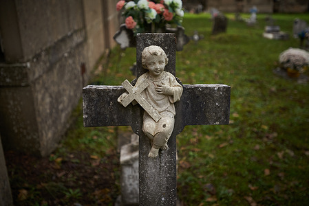 Detail of a grave of a deceased child at Pamplona Cemetery, during the celebration of All Saints' Day in Spain.