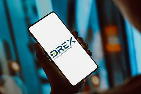 In this photo illustration, the Drex (Digital Real X) logo is displayed on a smartphone screen.
