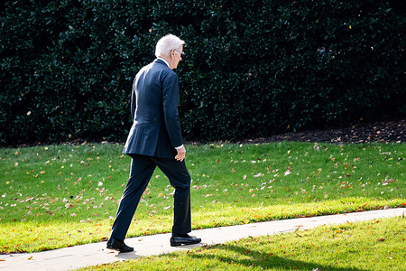 President Joe Biden on the South lawn walking to the White House.