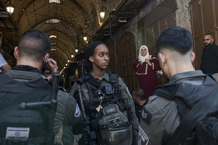 Israeli police force seen around the entrance of the Al-asaq mosque in Jerusalem while carrying out access controls. The Israeli police carried out security checks to restrict access to Jerusalem's main Al-Aqsa mosque in the old city. Police security checks on Israel's Muslim community have been the subject of controversy in recent years. Critics say these checks are a form of discrimination and oppression, while advocates say they are necessary to ensure safety.