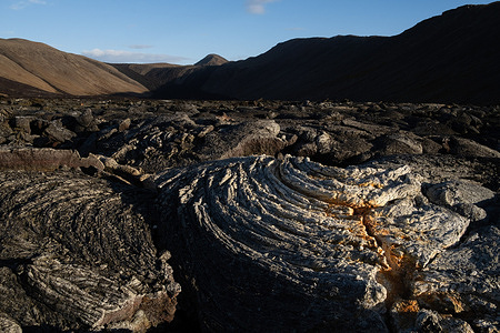 A lava field formed after the 2021 eruption of the Fagradalsfjall volcano. The site is located a few kilometers from Grindavik. Iceland is preparing for another volcanic eruption on the Reykjanes peninsula. After more than 1400 earthquakes during the last 48 hours in the Grindavik area, experts warn of a very likely volcanic eruption in the coming days. In 2021, 2022, and 2023, successive volcanic eruptions occurred near the Grindavik area, populated with some 3200 people. For the time being, the well-known Blue Lagoon thermal spa has closed its doors due to the great risk that a volcanic fissure could open up in the same area.