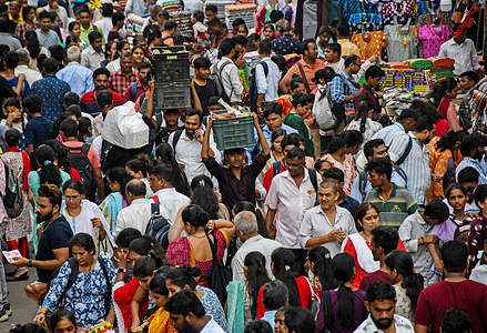 Crowd of people are seen shopping at Dadar (area in South Mumbai) market ahead of festival of lights, Diwali in Mumbai. Dhanteras marks the beginning of the Diwali festival where Hindus shop for new clothes, sweets, gold, silver jewelry, and lanterns believed to bring good fortune.