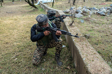 Indian army soldiers take position at the site of gunfight in Parigam Pulwama, south of Srinagar. Indian police officials informed local media that a gunfight occurred between Indian forces and separatist militants on Saturday. This ensued after launching a cordon and search operation in Parigam village, Pulwama, based on specific intelligence about militant presence. As the joint Indian forces and police team approached the suspected area, militants in hiding opened fire, leading to a retaliatory exchange and triggering the gunfight. However, the militants managed to escape after a brief gunfire exchange.