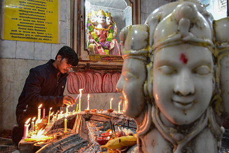A Hindu devotee light candles on the occasion of Diwali, the Hindu festival of lights, in Srinagar. Deepavali or Dipavali is a four-five day-long festival of lights, which is celebrated by Hindus every autumn.
