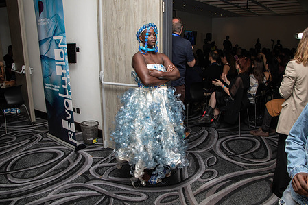A model wearing clothes made of plastic waste awaits her entrance onto the stage during a legislative theatre performance titled, 'Who Knows It Feels It'. A Waste Picker’s Perspective for a Just Transition’ before the commencing of UN’s Intergovernmental Negotiating Committee third round of negotiations to develop a legally binding plastics Treaty starting Monday at United Nation Environment program Headquarters. Kenyan waste pickers are calling for a treaty that will address their plight as important players in plastic value chain.