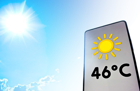 In this photo illustration, the thermometer showing 46ºC of heat is displayed on a smartphone screen.