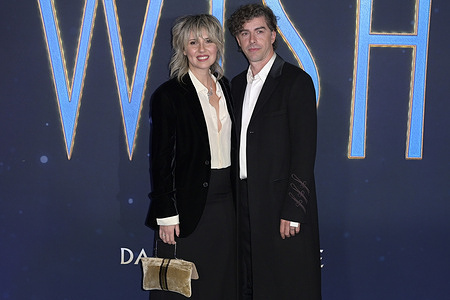 Eva Nestori (l) and Michele Riondino (r) attend at the blue carpet for the premiere of Disney movie Wish at The Space Cinema Modreno.