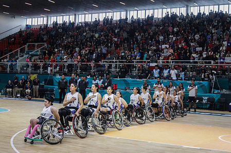 Chilean players sing the national anthem prior to the Wheelchair basketball match between Chile and the United States, development of the Santiago 2023 Parapan American Games.