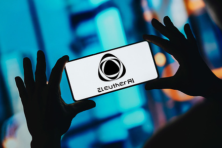 In this photo illustration, the Eleuther AI logo is displayed on a smartphone screen.