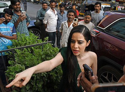 Indian television actress and social media personality Uorfi Javed interacts with the media as she leaves after a personal photo shoot at a studio. The actress was spotted outside a studio where she had gone for her personal shoot.