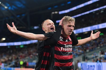 Jack Clisby (L), Zachary Albert Sapsford (R) of the Western Sydney Wanderers team seen celebrating a goal during the A-League 2023/24 season round 5 match between Sydney FC and Western Sydney Wanderers FC held at the Allianz Stadium. Final score; Western Sydney Wanderers 1:0 Sydney FC.