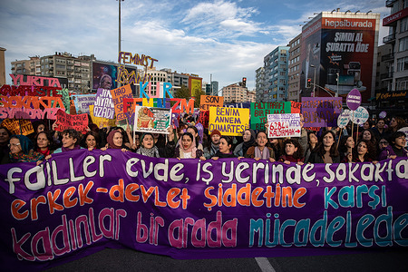 Women hold a banner and placards expressing their opinion during the demonstration. Women came together on the occasion of the International Day for the Elimination of Violence Against Women in Istanbul.