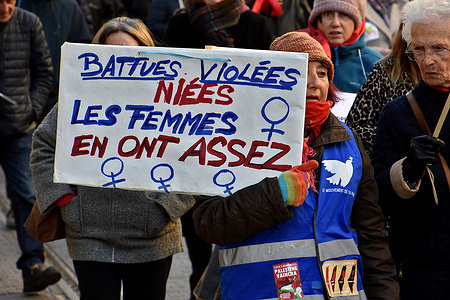 A female protester holds a placard saying “beaten, raped, denied, women have had enough” during the demonstration. Demonstration against violence against women in Marseille.