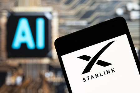 In this photo illustration, the American aerospace company SpaceX, owned and operated by Elon Musk, Starlink logo seen displayed on a smartphone with an Artificial intelligence (AI) chip and symbol in the background.