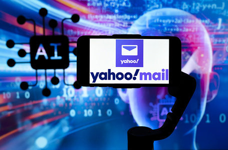 In this photo illustration, the logo of Yahoo Mail is seen displayed on a mobile phone screen with AI (artificial intelligence) written in the background.