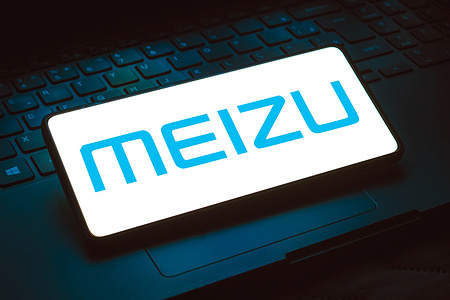 In this photo illustration, the Meizu logo is displayed on a smartphone screen.