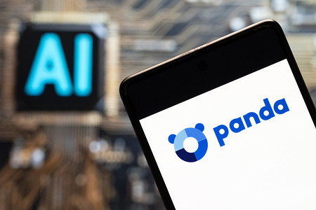 In this photo illustration, the Spanish company that specializes in creating products for IT security such as antivirus software Panda Security logo seen displayed on a smartphone with an Artificial intelligence (AI) chip and symbol in the background.