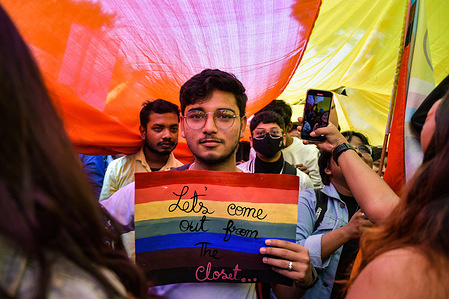 A member of The LGBTQ+ community of Kolkata holds a placard during the rally. The LGBTQ+ community of Kolkata participated in a rally to celebrate pride and demand equal LGBTQ rights, promoting equality, honoring differences, and fighting for justice against discrimination for all types of gender in Kolkata. Kolkata Pride Walk is the oldest Pride Walk in Asia.