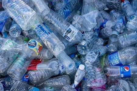 A large pile of clear plastic bottles at a sorting and compacting facility in Bang Phli in Samut Prakan. Out of the 8 million tons of plastic waste the country generates, only 25% is recycled, and over 50,000 tons end up in the ocean every year. However, the Thai Government implemented a plan to ban all plastic imports by 2025, which has already resulted in a decrease in imported plastic into the Kingdom, which imported 180,000 tons in 2022.