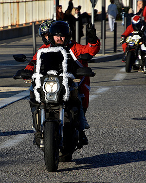 A biker dressed as Santa Claus parades through the streets of Marseille. 1,325 bikers dressed as Santa Claus parade through the streets of Marseille to deliver gifts to sick children. The principle of this “Santa ride” is that each biker must come with a gift.