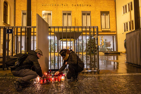 People light candles in front of Charles University's main building following the shooting at one of its buildings in Prague. On December 21, a 24-year-old philosophy student attacked Charles University in Prague, killing 14 people and injuring over 25 others, as reported by the police. The suspect also died, but it remains undisclosed whether it was self-inflicted or during a confrontation with the police officers. A week earlier, the suspect's father was discovered deceased at their residence. Investigators are examining the suspect's possible involvement in his father's death. They added that the motive is still unclear as the suspect is an excellent student with no criminal record. This is recorded as the worst mass shooting in the Czech Republic.