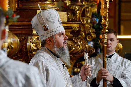 Metropolitan Epiphanius of Kyiv attends a Christmas service at the Saint Sophia Cathedral. This year, Ukrainians are marking their first Christmas on December 25, adhering to the Gregorian calendar, departing from their traditional Julian calendar observed by most Orthodox believers. This adjustment stands as a deliberate divergence from Russia.