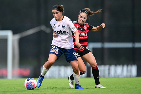 Rachel Georgia Wehl Lowe (L) of Melbourne Victory FC and Melissa Caceres (R) of Western Sydney Wanderers FC are seen in action during the Women's A-League 2023/24 season round 10 match between Western Sydney Wanderers FC and Melbourne Victory FC held at the Wanderers Football Park. Final score; Western Sydney Wanderers 2:0 Melbourne Victory FC.