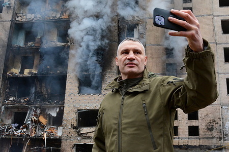 Kyiv Mayor Vytaly Klitschko seen recording the damage of the rocket attack in the center of Kyiv. Today morning, Russian forces launched a massive missile strike on Kiev. Debris fell and buildings caught fire in several districts of the city. The consequences were particularly severe in the Solomianskyi District, where a multi-story building caught fire.