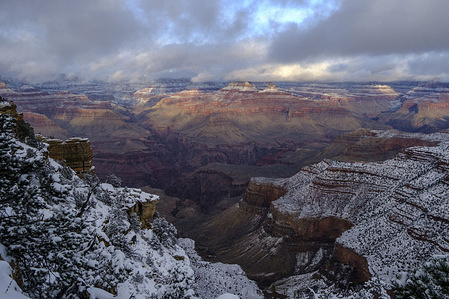 View of snow on the cliffs of The Grand Canyon taken along the southern rim of the canyon following a snow storm that left 3 or more inches of snow throughout the park and shut down roads around it.