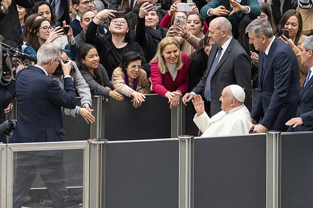 Pope Francis greets the pilgrims during his traditional Wednesday General Audience at Paul VI Audience Hall.