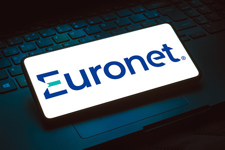 In this photo illustration, the Euronet Worldwide, Inc. logo is displayed on a smartphone screen.