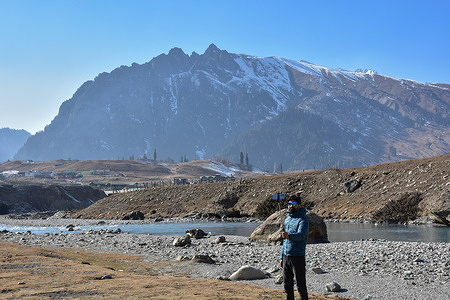 A visitor takes a selfie at the dried and snow-less field during a sunny winter day in Sonamarg hill station, about 100kms from Srinagar. A prolonged dry spell is sweeping across Kashmir valley during the harshest phase of winter. Tourist resorts such as Gulmarg, Pahalgam, and Sonamarg would typically have accumulated ample snow by now. But this year, the Kashmir valley is dry with no snow anywhere to be seen. While the tourism sector has got hit badly, as tourists, who had planned to visit the Valley during January to enjoy snow, are cancelling their trips.