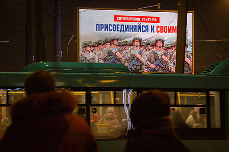 A Russian Ministry of Defense billboard is calling citizens to volunteer to join the special military operation on the territory of Ukraine with the inscription "Join Your People" on the streets in St. Petersburg.