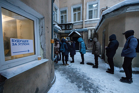 People queue in a street courtyard at the campaign headquarters of the Civil Initiative party's presidential candidate Boris Nadezhdin to sign in with their support for him. The 2024 Russian presidential elections are scheduled to occur from March 15 to 17, spanning three days. To qualify as a presidential candidate, Nadezhdin aims to secure 100 thousand signatures in support of his nomination. These signatures are necessary for the Central Election Commission of Russia to register him as an official candidate in the upcoming elections.