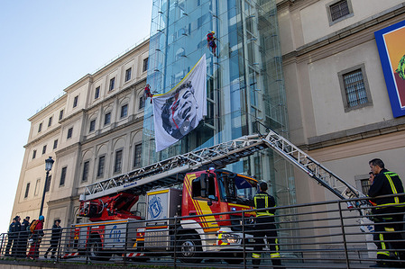 A fire truck stands by, ready to assist Greenpeace activists descending from the building facades of the Reina Sofia Museum in Madrid. Greenpeace activists gathered this morning near the Reina Sofia Museum in Madrid to call for a ceasefire in the Israel-Hamas conflict. During the demonstration, they showcased an illustration by the American visual artist Shepard Fairey, known for his "Obey" campaign.