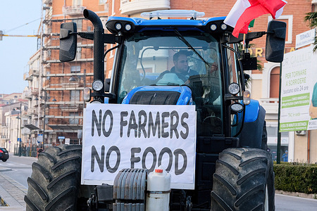 A placard is seen on a tractor that says "No farmers no food" during the demonstration. The waves of protests initially ignited in France, Germany, and Romania, have now spread to Italy, encompassing farmers from diverse regions, including Molise. Unified in their opposition, farmers have gathered to express their discontent with the new community directives. Their grievances primarily revolve around the rising costs of agricultural diesel and raw materials, perceived unfair competition from international products, and concerns about the environmental policies of the European Union.