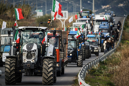 Tractors arrive at the Regional Citadel of Catanzaro during the demonstration. Farmers from Lamezia Terme and Crotone areas converged on the Regional Citadel of Catanzaro to protest against European restrictions on agriculture and increasing prices.