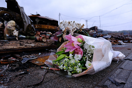Flowers were placed at the Wajima Morning Market, a popular tourist destination that was destroyed in the wake of the Noto Peninsula earthquake on Jan 1, 2024. The earthquake, centered in the Noto region of Ishikawa Prefecture, reached an intensity of up to 7 on the Japanese scale, resulting in widespread damage. Ishikawa Prefecture reported that the confirmed fatalities in the region remained at 240 as of 2:00 p.m. on February 2.
