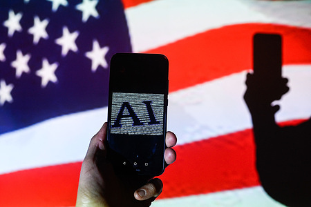 In this photo illustration, an Artificial Intelligence (AI) symbol is displayed on a smartphone with the US flag in the background.