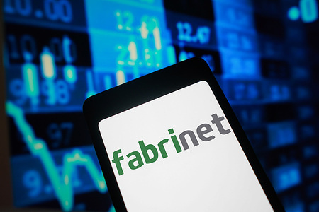 In this photo illustration, the Fabrinet logo is displayed on a smartphone screen.