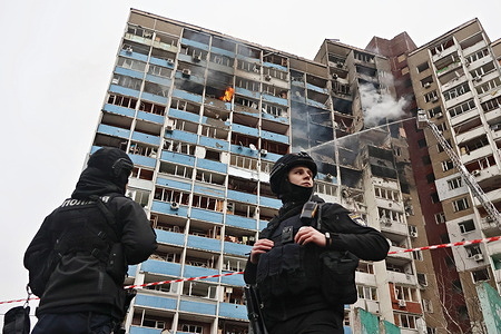 Ukrainian rescuers extinguish a fire in a residential building following a missile attack in Kyiv amid the Russian invasion of Ukraine. Russia launched a missile strike on Kyiv, Ukraine, according to the statement from local authorities, more than 20 rockets were shot down.